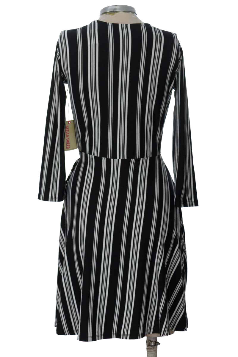 Vestido / Enterizo color Negro - Stella Tweed