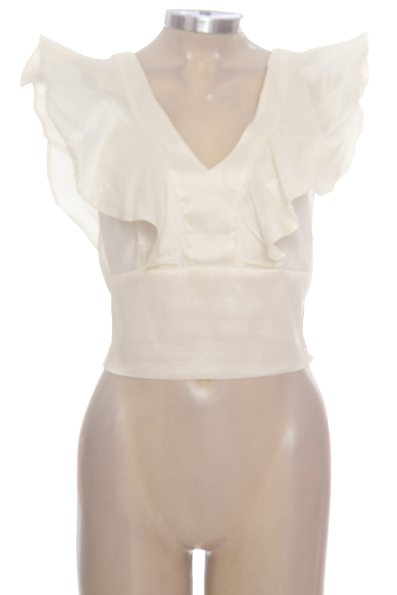 Top / Camiseta color Beige - Closeando