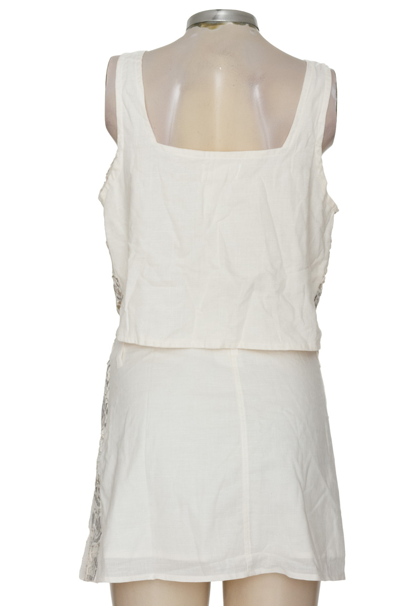 Vestido / Enterizo color Beige - Tennis