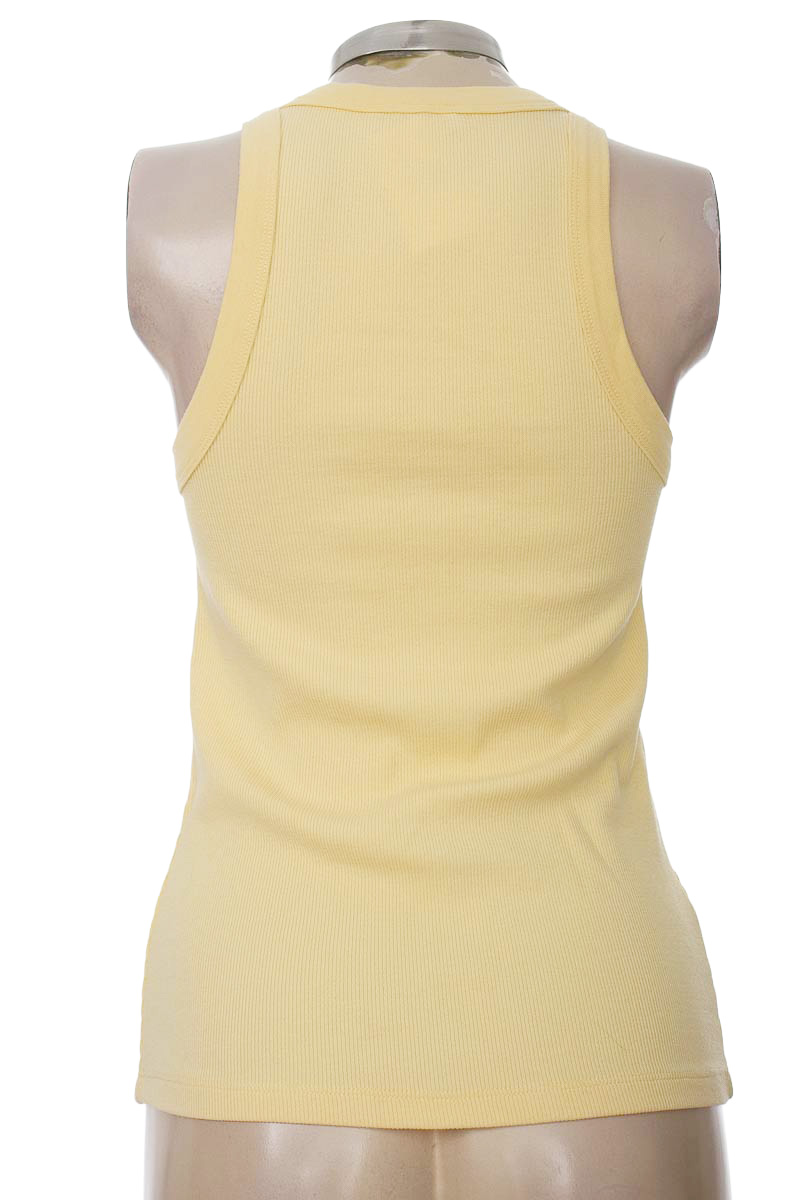Top / Camiseta color Amarillo - Punto Blanco