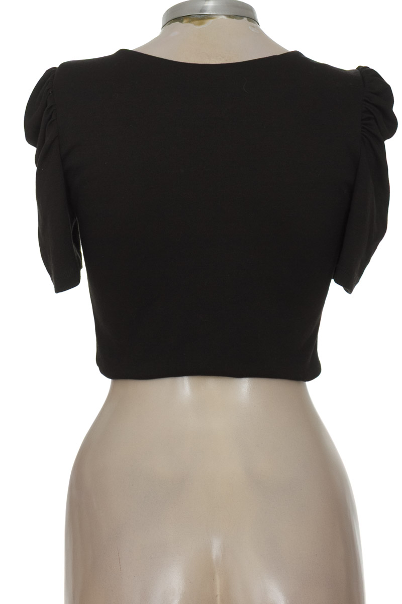 Top / Camiseta color Negro - Irreal