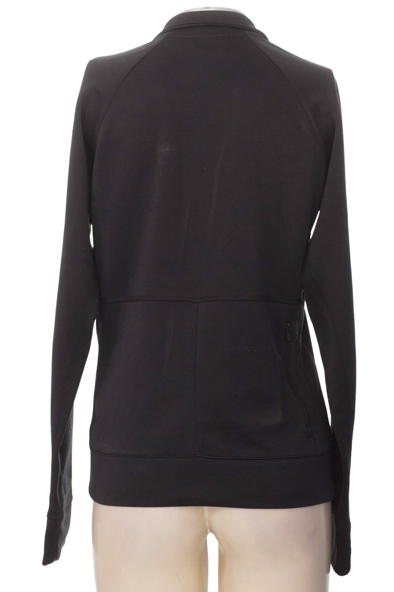 Ropa Deportiva / Salida de Baño color Negro - Nike