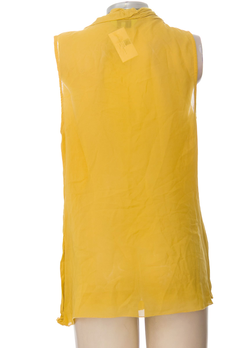 Top / Camiseta color Mostaza - Beso de Coco