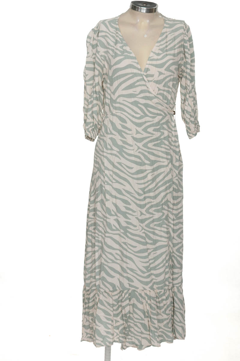 Vestido / Enterizo color Beige - Centrica