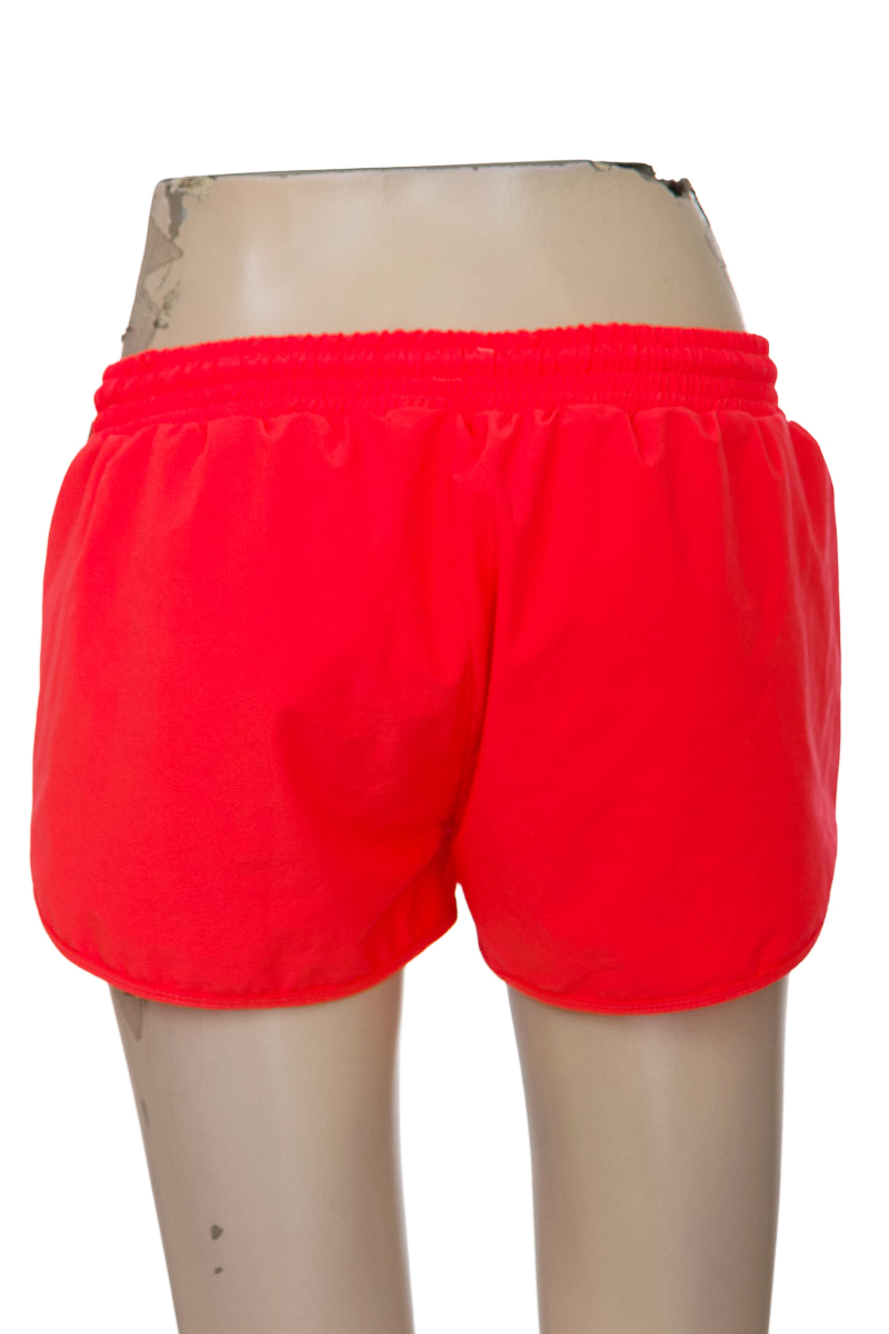 Ropa Deportiva / Salida de Baño color Naranja - Closeando