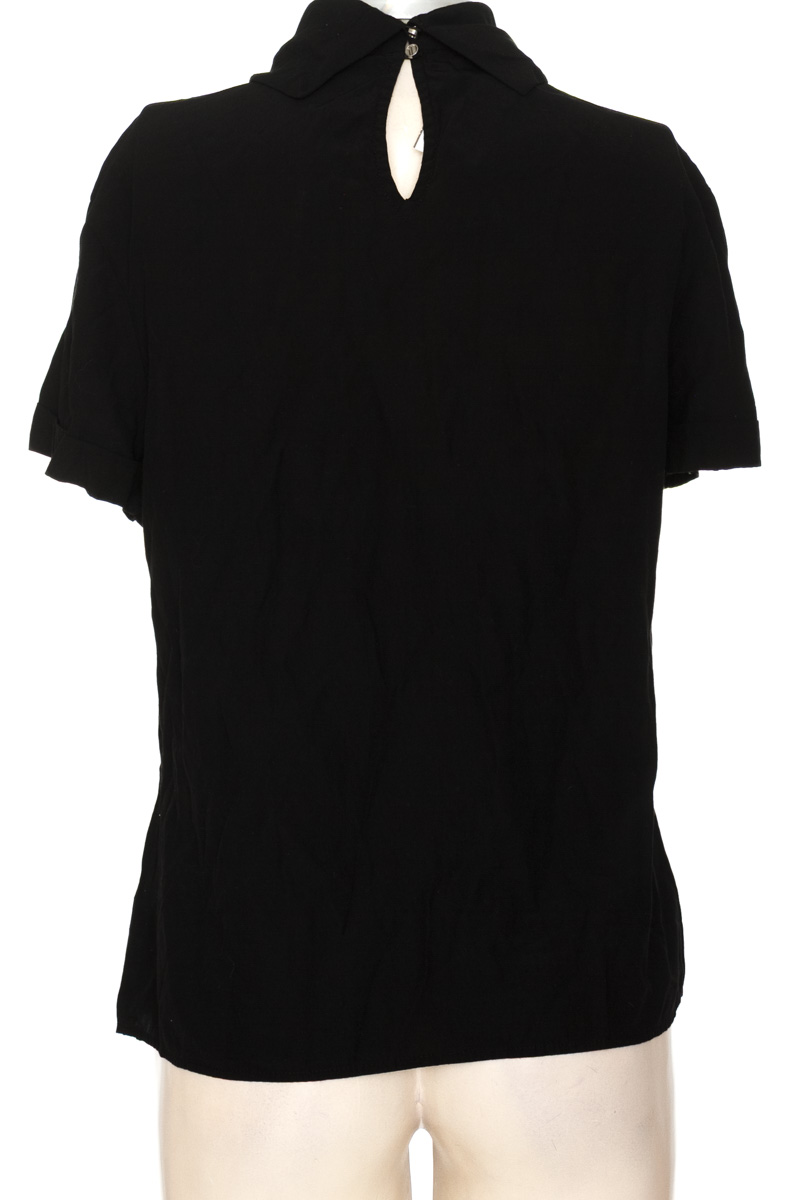 Blusa color Negro - Closeando