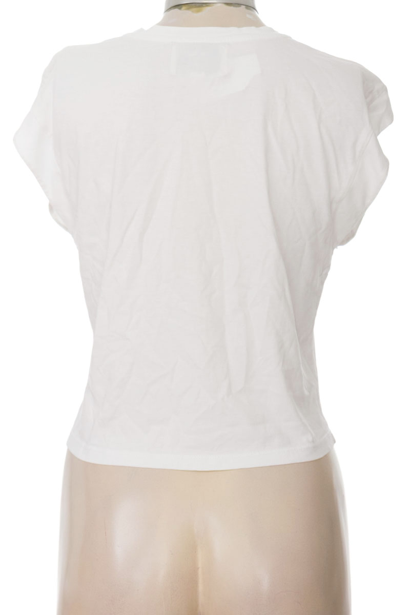 Top / Camiseta color Blanco - Lobo Rosa x Falabella