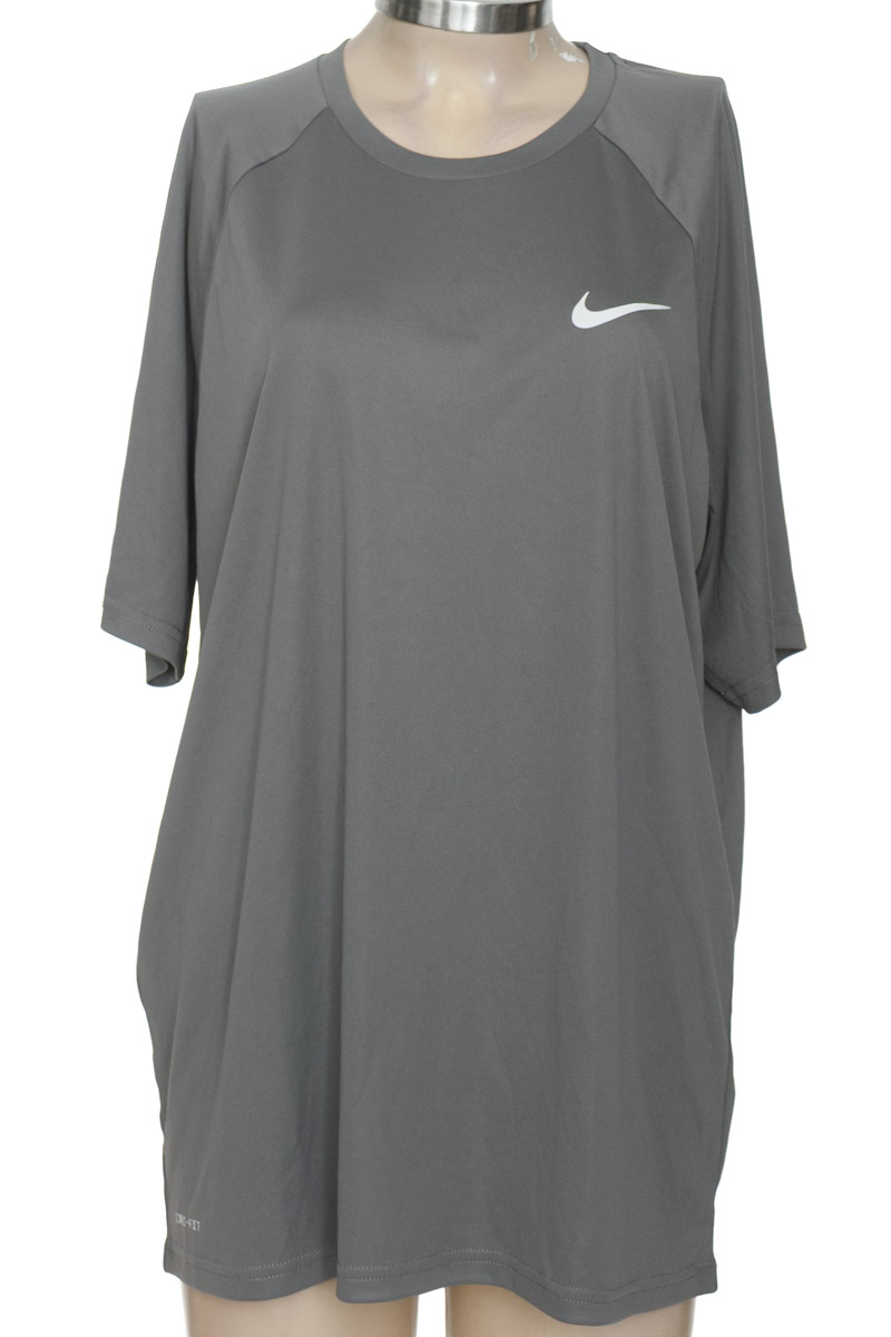 Ropa Deportiva / Salida de Baño color Gris - Nike