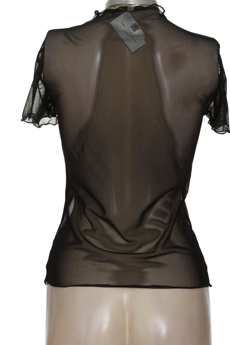 Top / Camiseta color Negro - Closeando