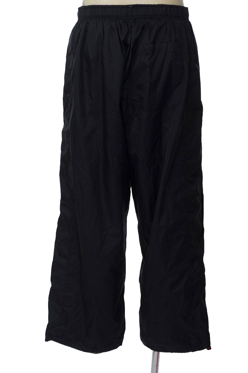 Ropa Deportiva / Salida de Baño color Negro - Nike