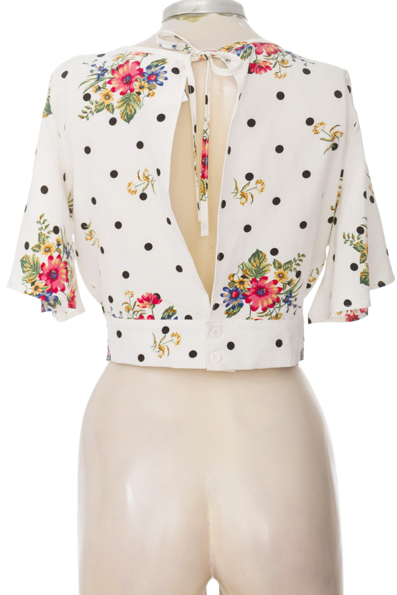 Top / Camiseta color Blanco - Red Aaple