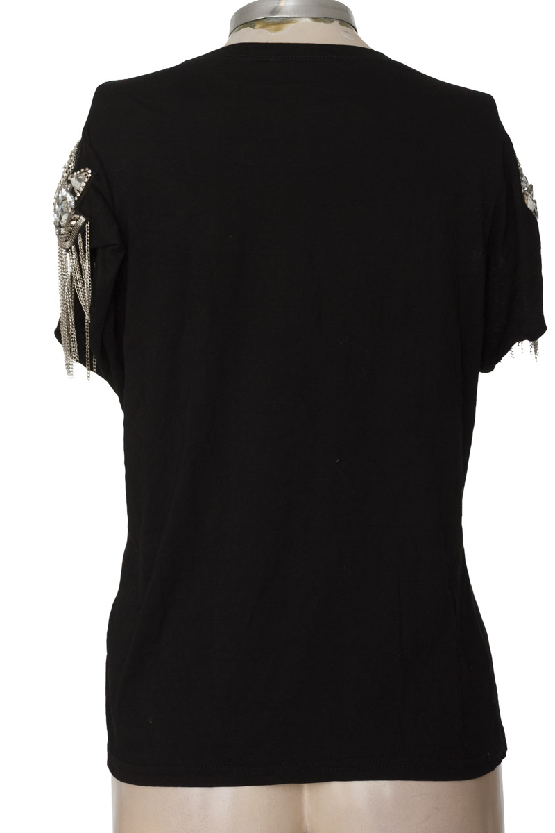 Top / Camiseta color Negro - Closeando