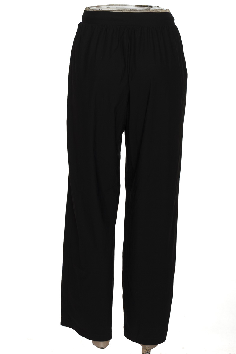 Ropa Deportiva / Salida de Baño color Negro - UNIQLO