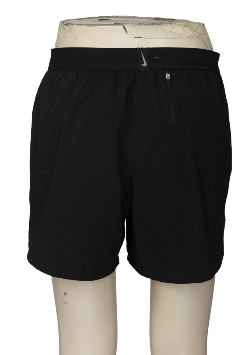Ropa Deportiva / Salida de Baño color Negro - Nike