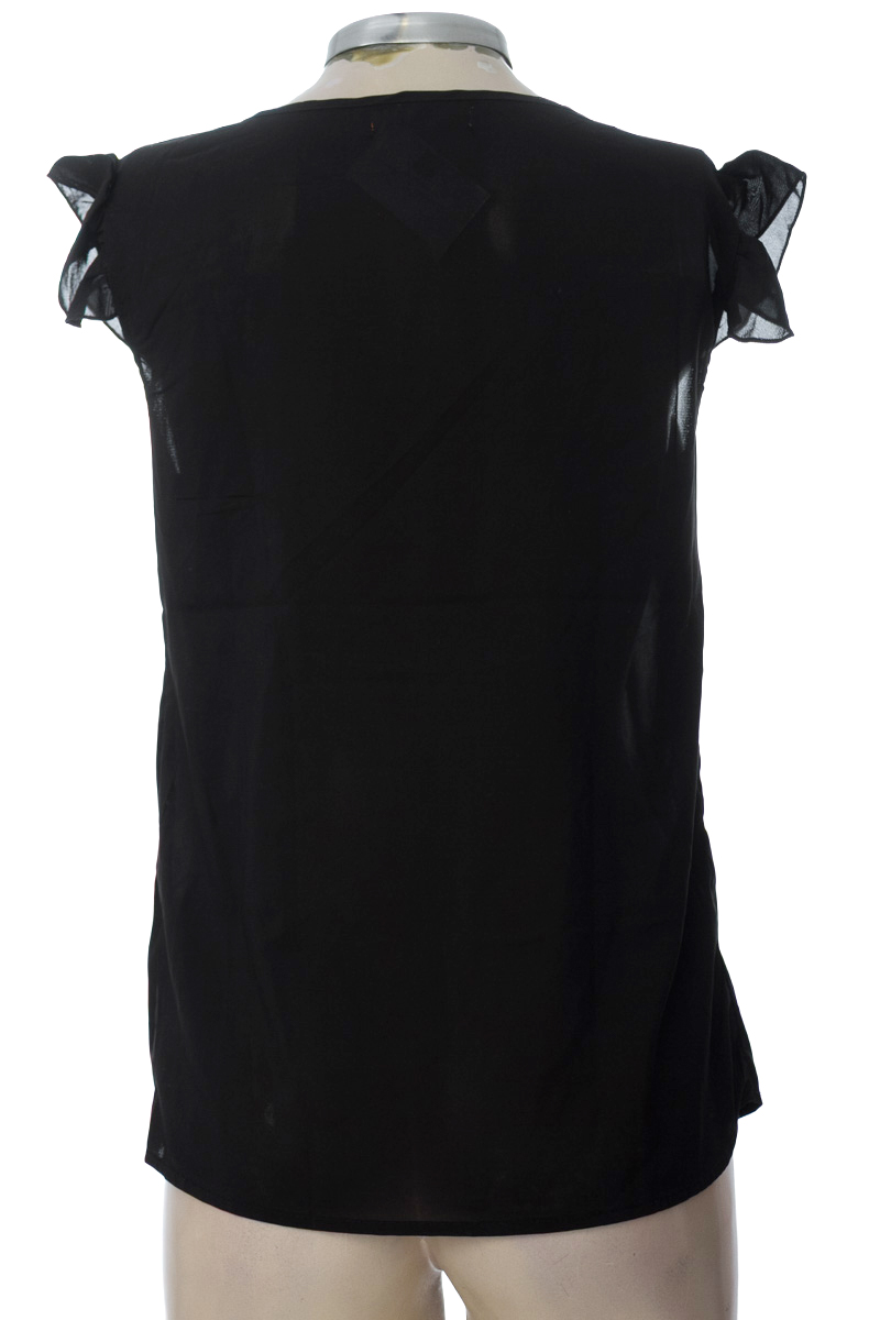 Top / Camiseta color Negro - Miss Hot
