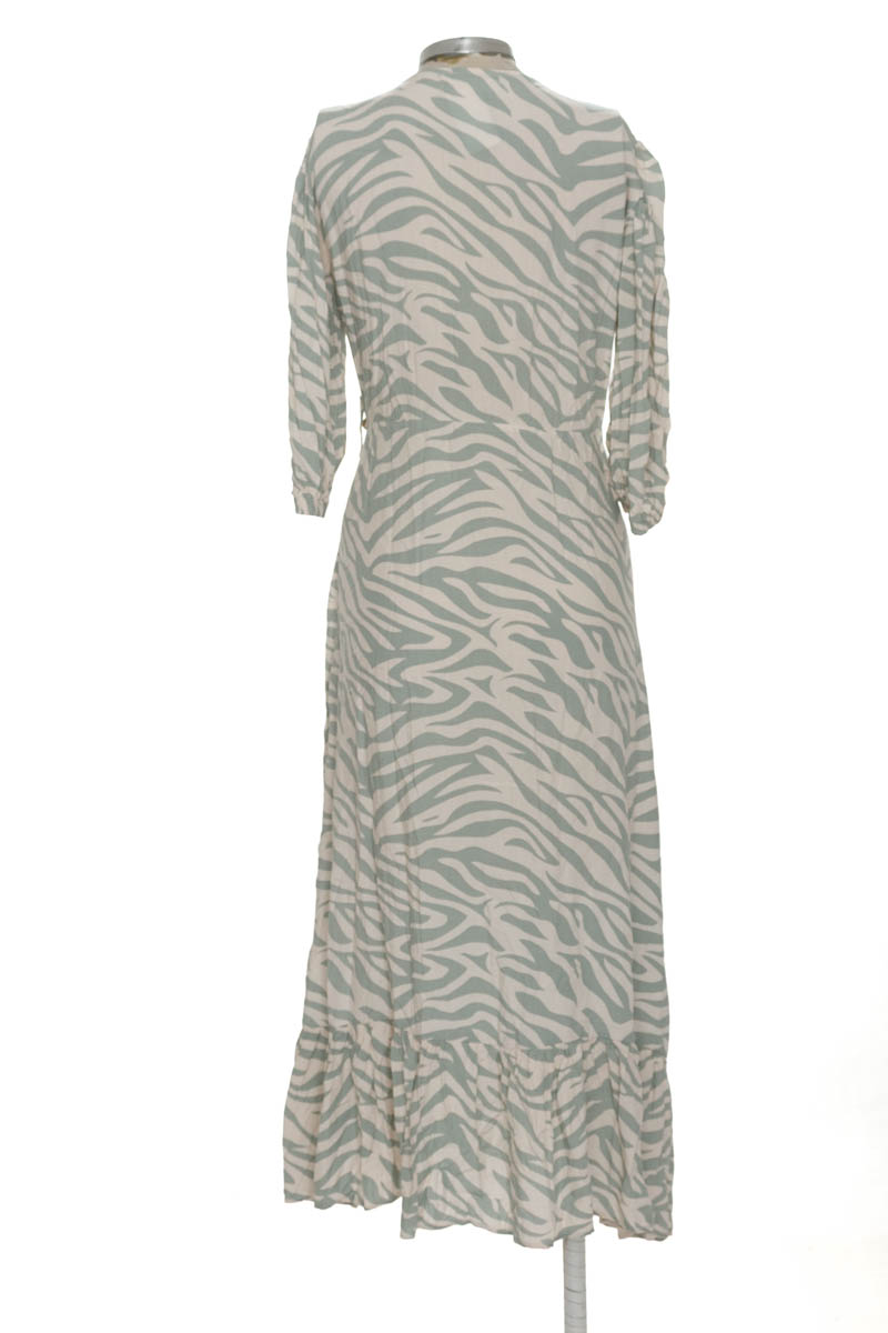 Vestido / Enterizo color Beige - Centrica