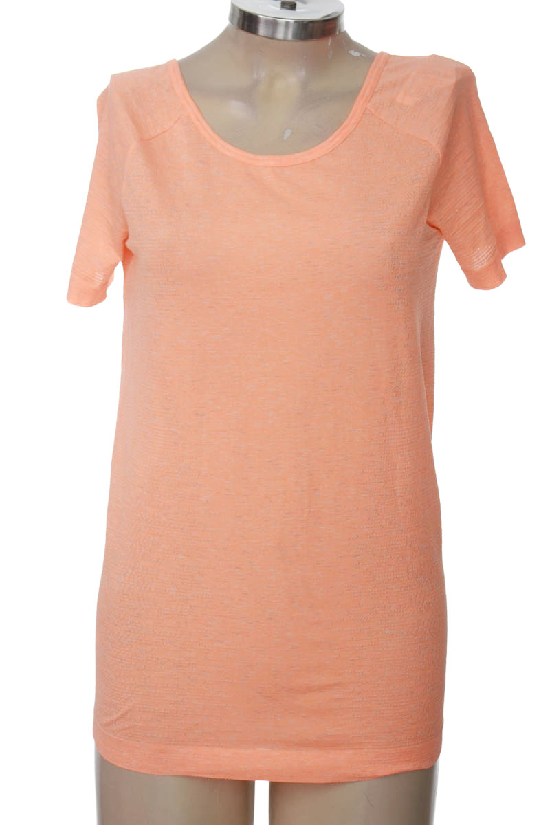 Ropa Deportiva / Salida de Baño color Naranja - Under Amour