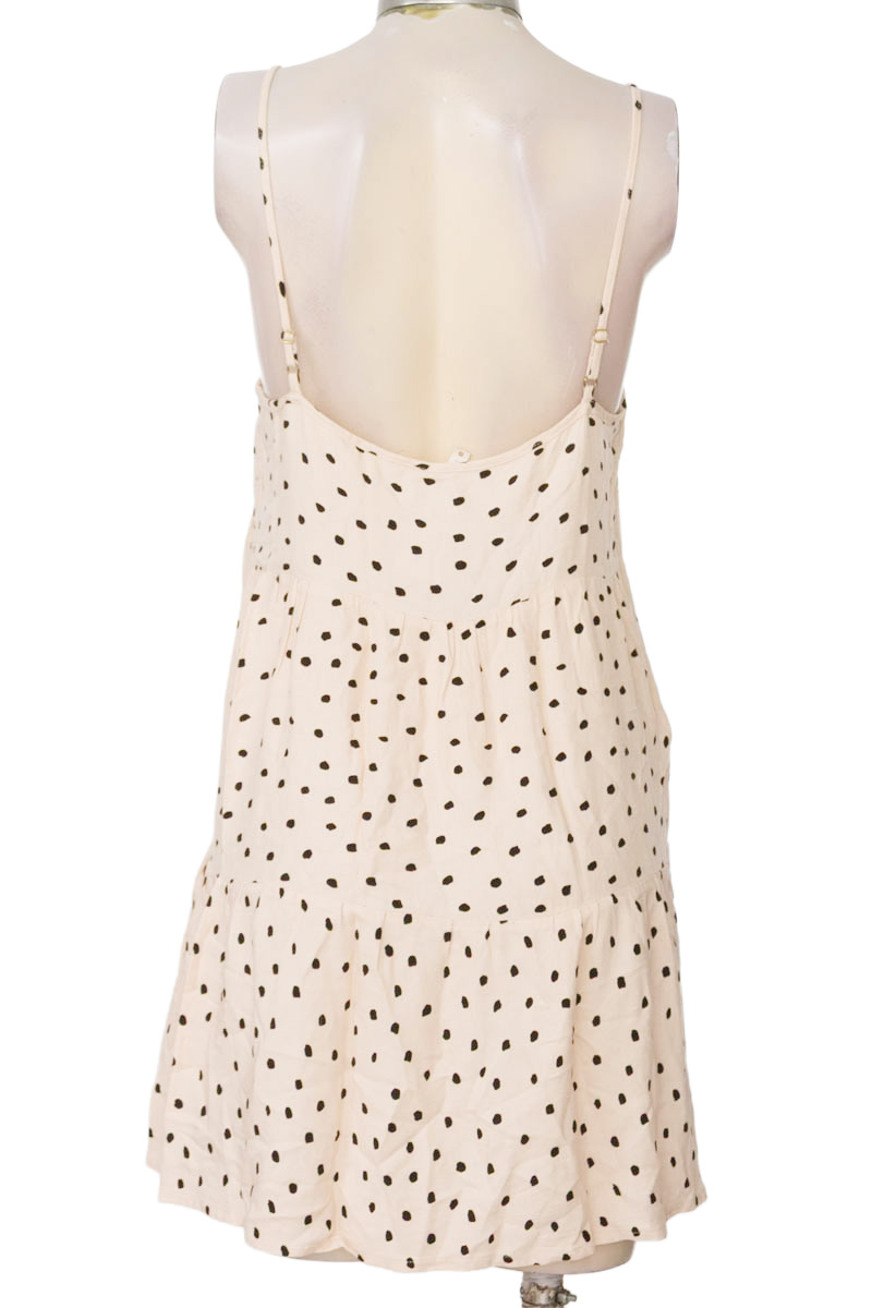 Vestido / Enterizo color Beige - Ticket