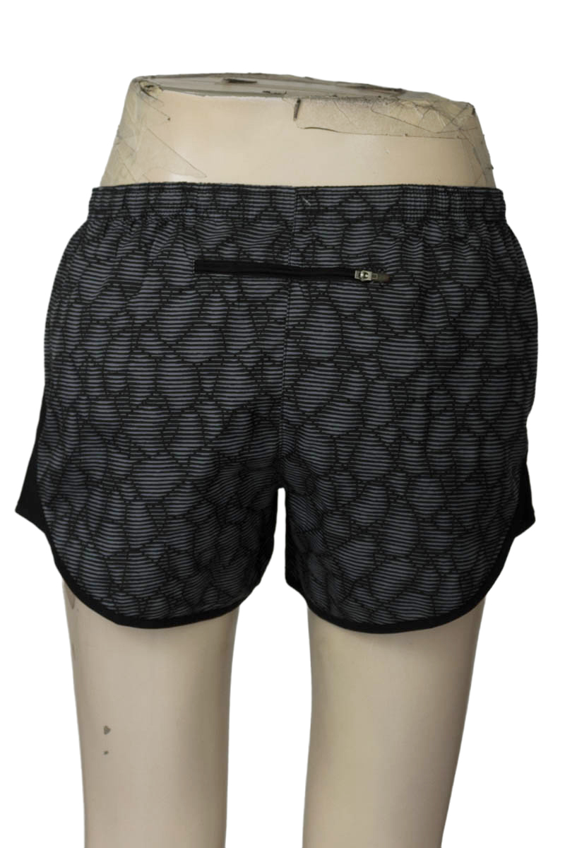 Ropa Deportiva / Salida de Baño color Gris - Nike