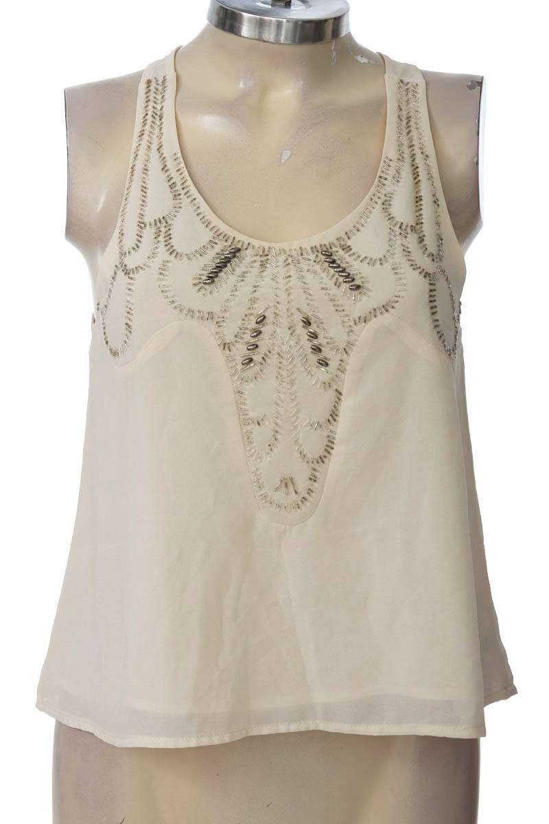 Top / Camiseta color Beige - The Clothing Company