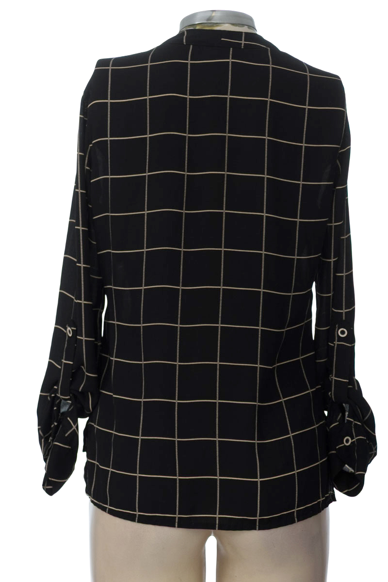 Blusa color Negro - XUSS