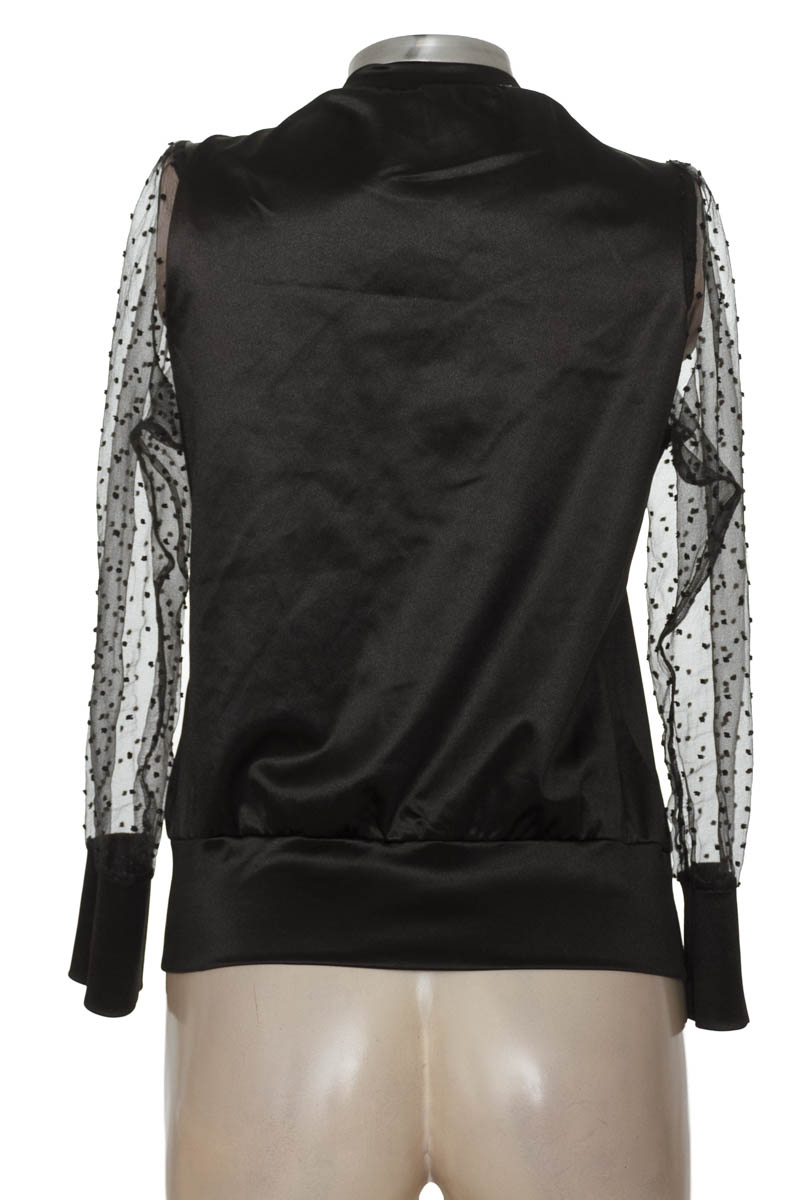 Blusa color Negro - Closeando