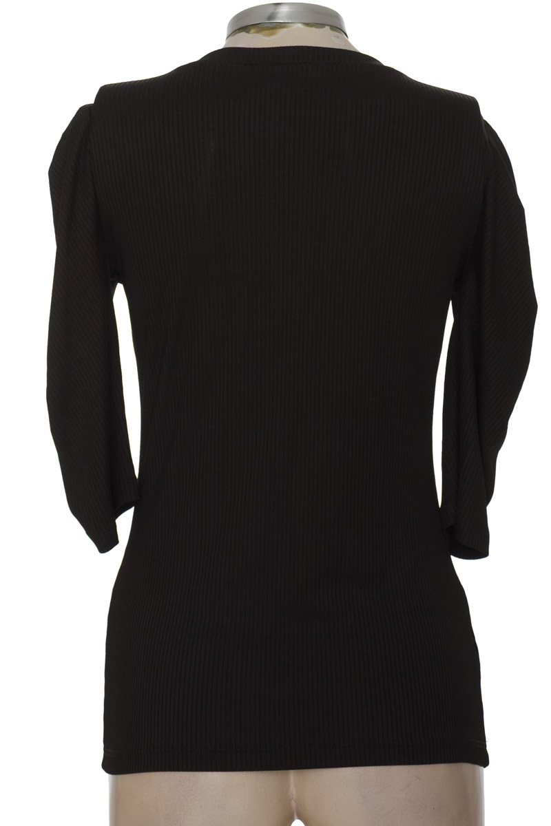 Top / Camiseta color Negro - Punto Blanco
