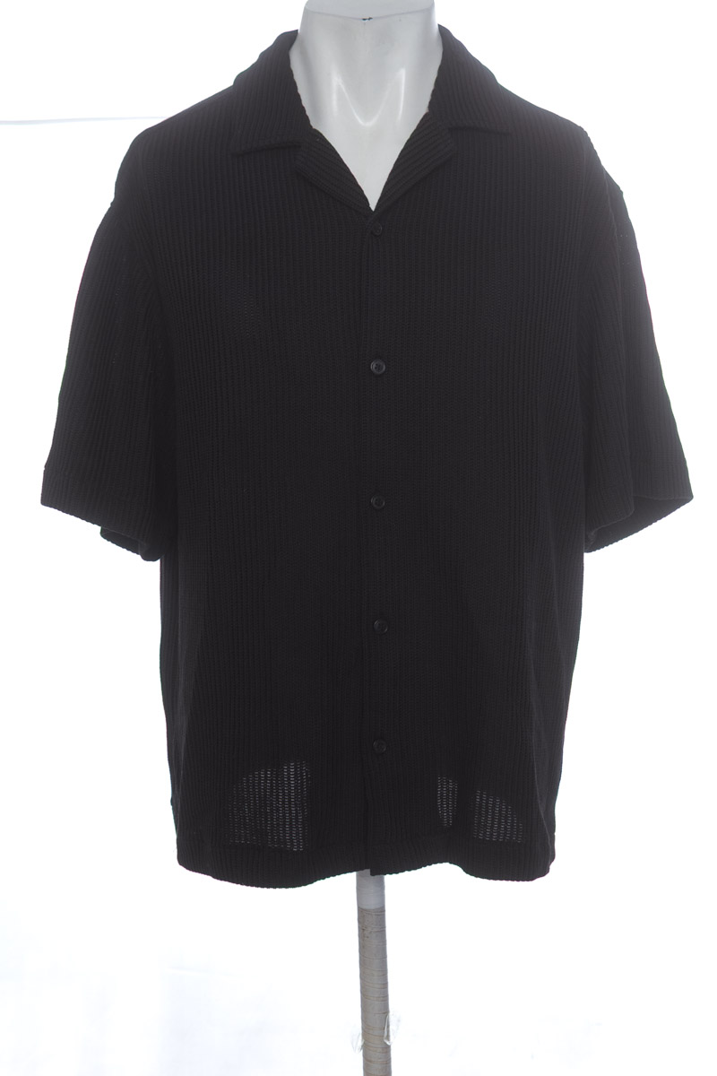 Polo color Negro - H&M