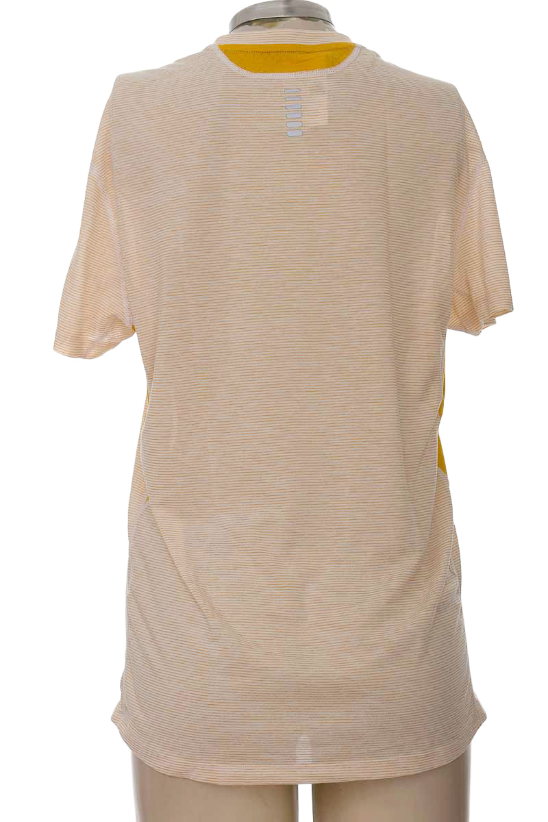 Ropa Deportiva / Salida de Baño color Mostaza - Under Armour