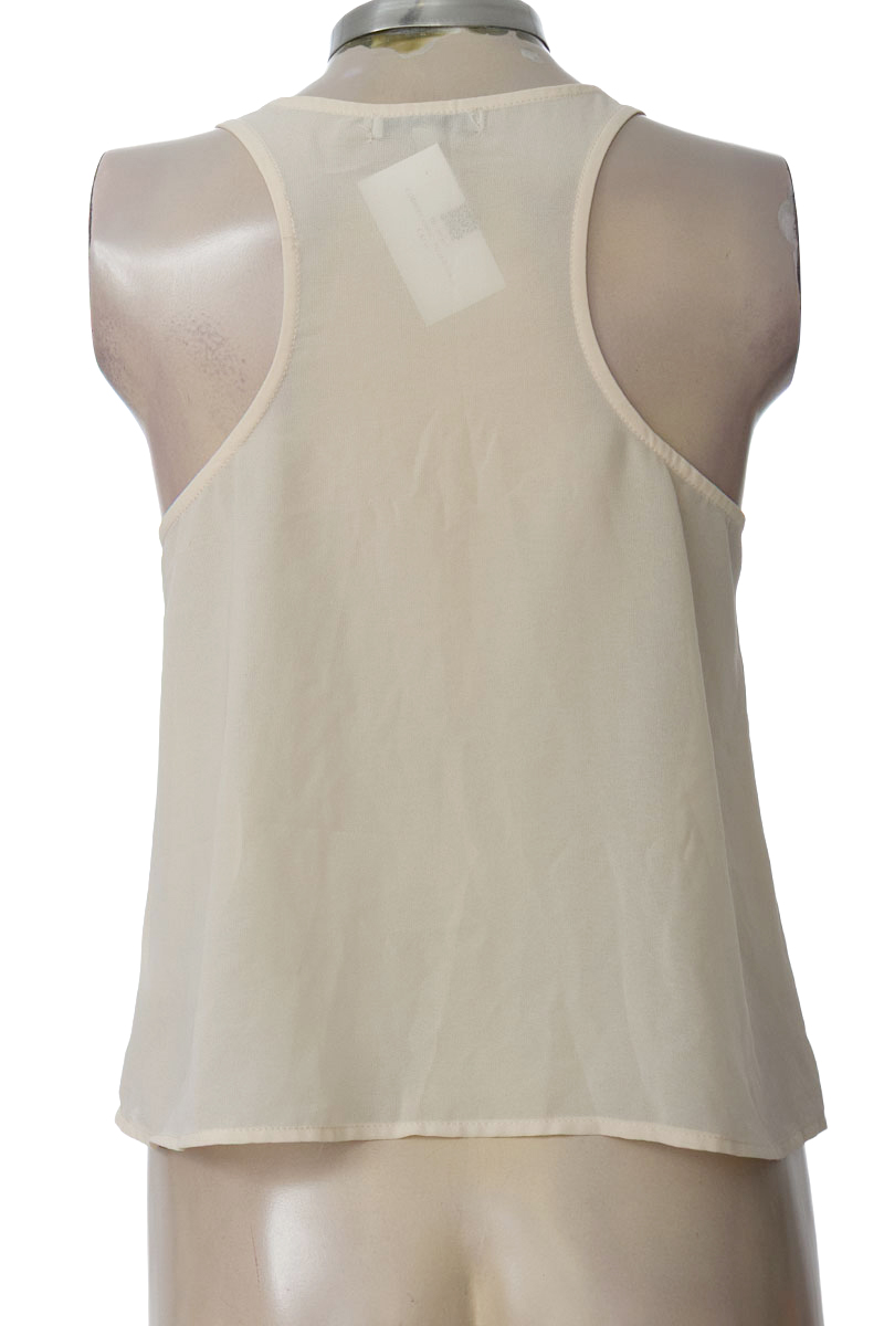 Top / Camiseta color Beige - The Clothing Company