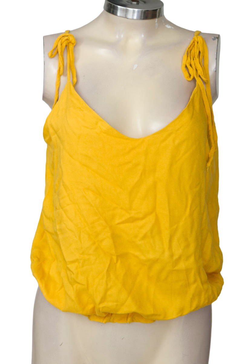 Top / Camiseta color Mostaza - Ticket