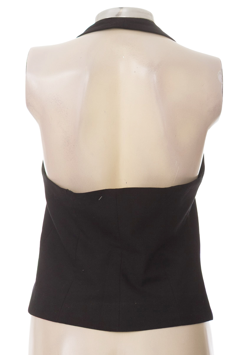 Chaqueta / Abrigo color Negro - Closeando