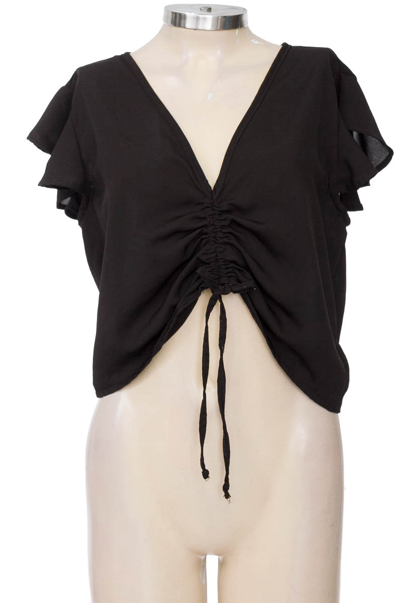 Top / Camiseta color Negro - Ticket