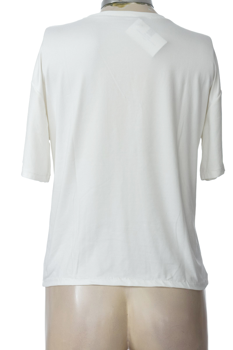 Top / Camiseta color Blanco - Closeando