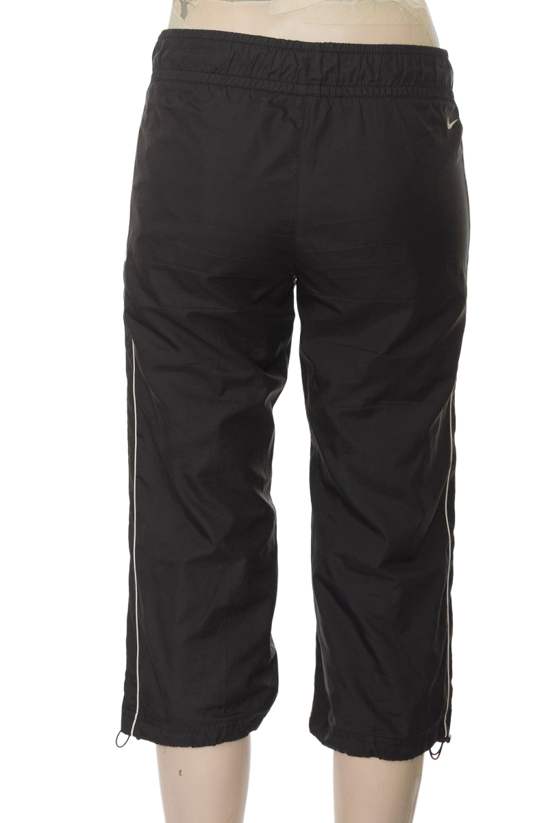 Ropa Deportiva / Salida de Baño color Negro - Nike