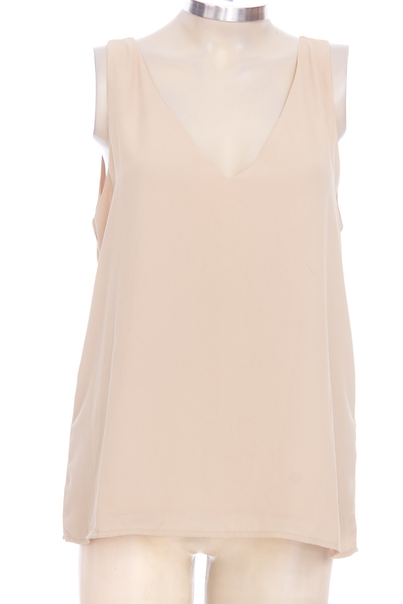 Top / Camiseta color Beige - Forever 21 talla M de Segunda Mano | Closeando