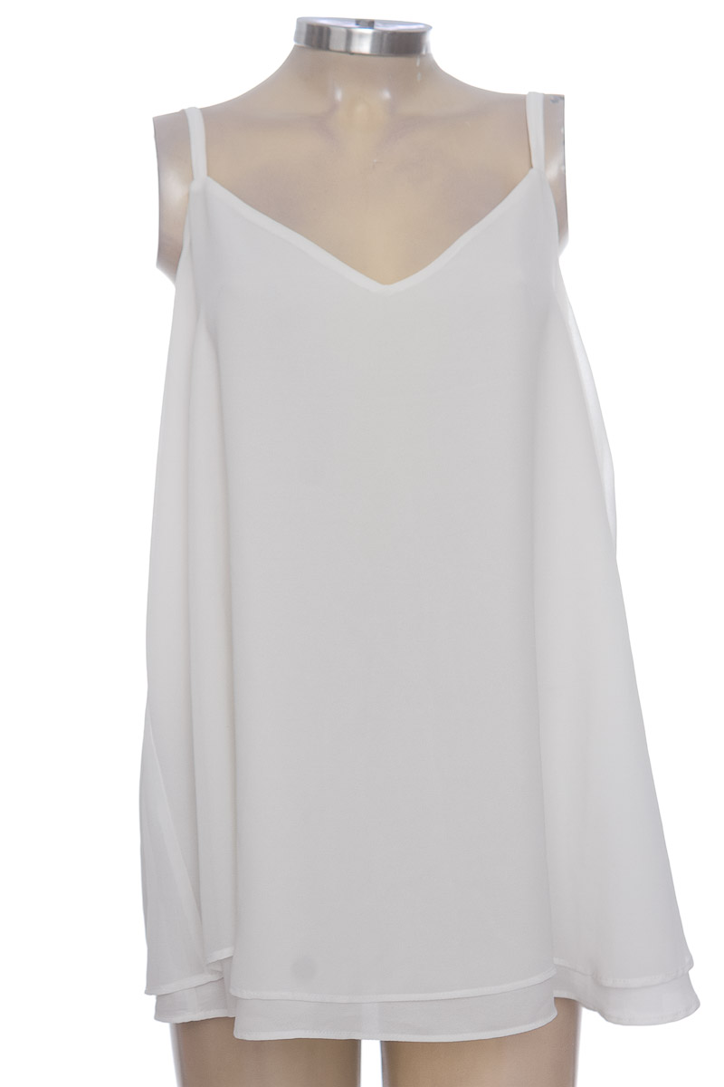 Top / Camiseta color Blanco - Torrid