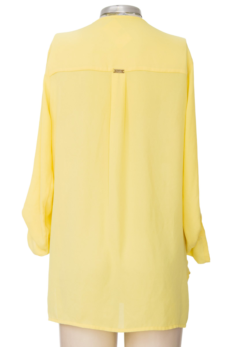 Blusa color Amarillo - Kritterium