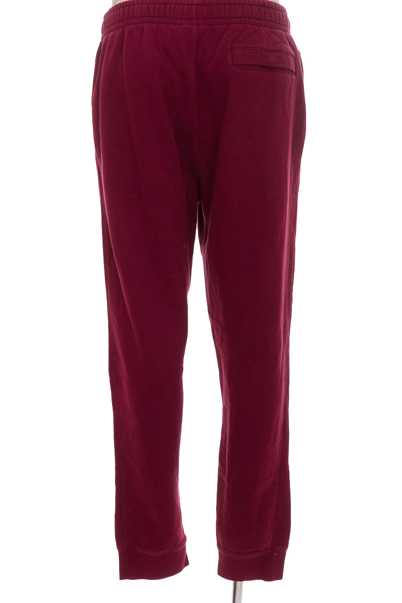 Ropa Deportiva / Salida de Baño color Vinotinto - Nike