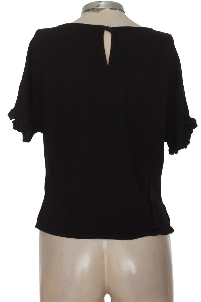 Top / Camiseta color Negro - NAF NAF
