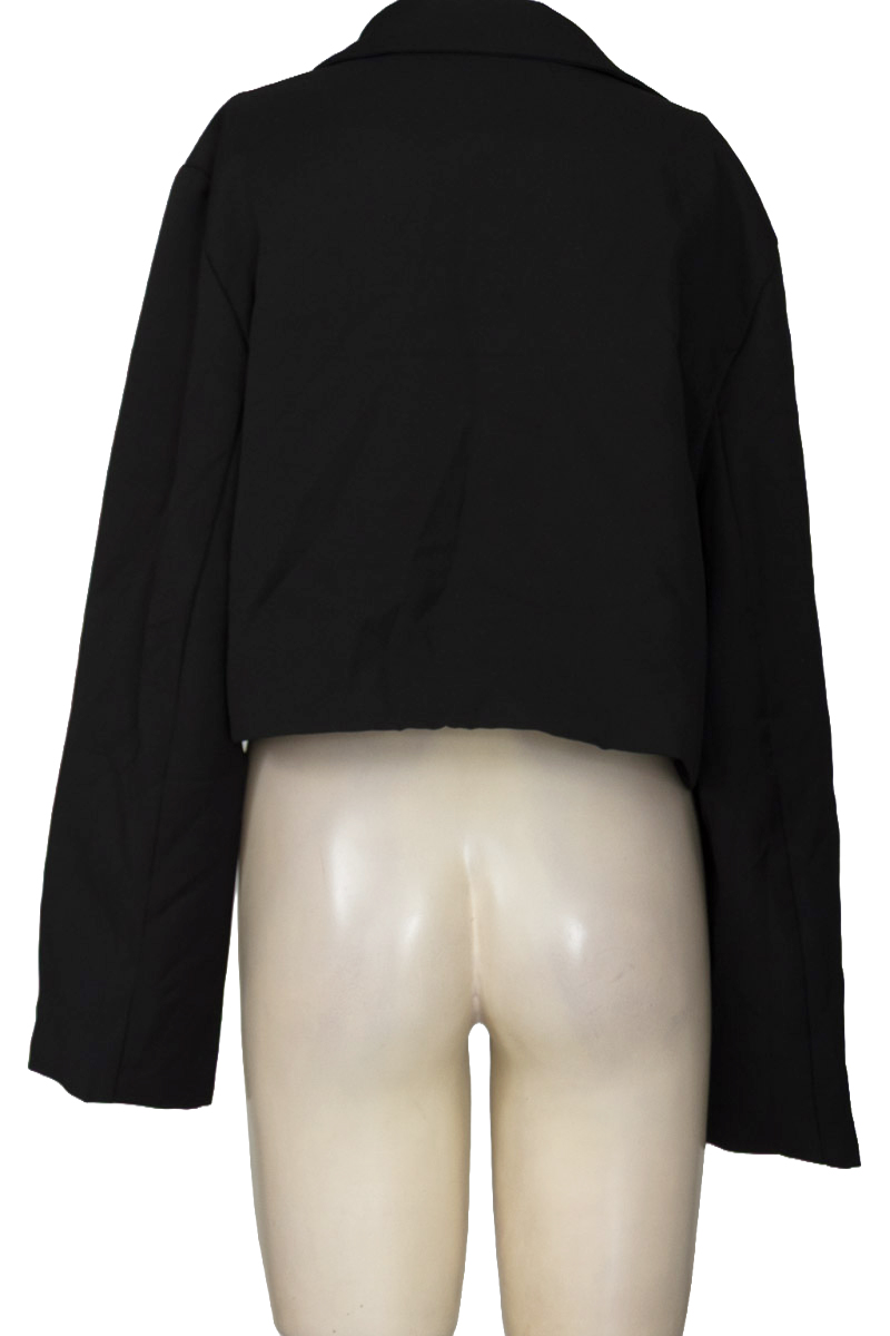 Chaqueta / Abrigo color Negro - Closeando