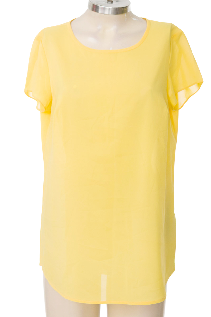 Top / Camiseta color Amarillo - Closeando