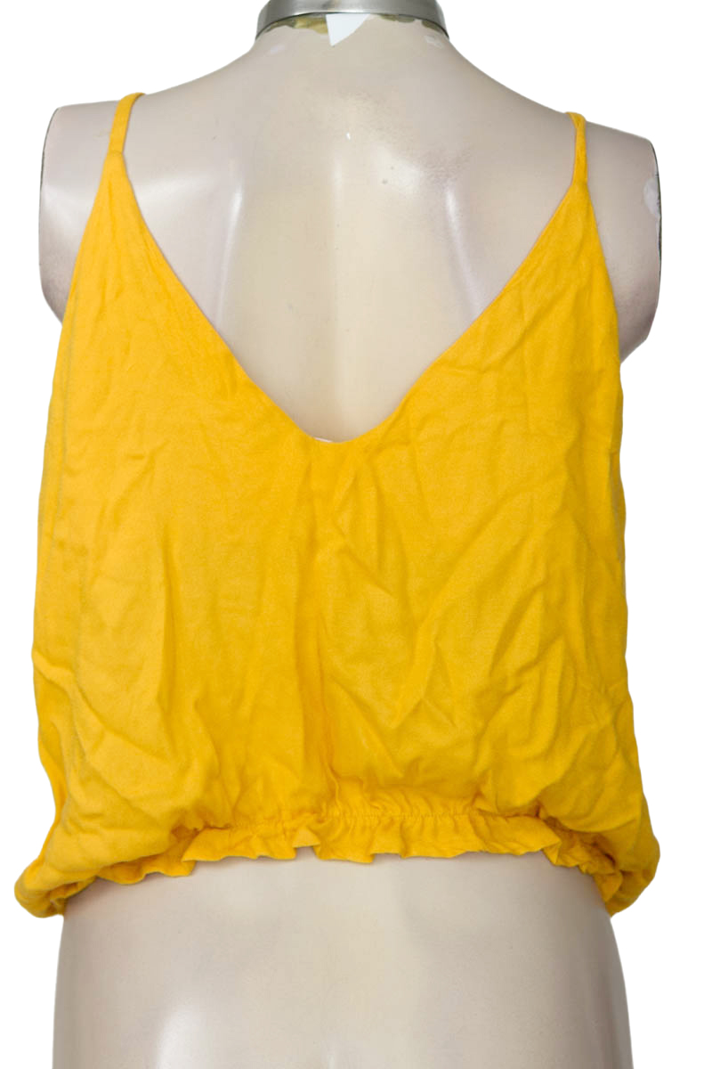 Top / Camiseta color Mostaza - Ticket