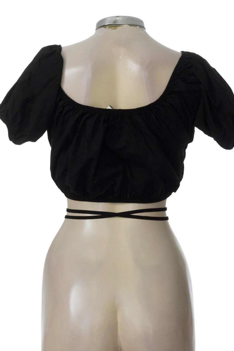 Top / Camiseta color Negro - NAF NAF