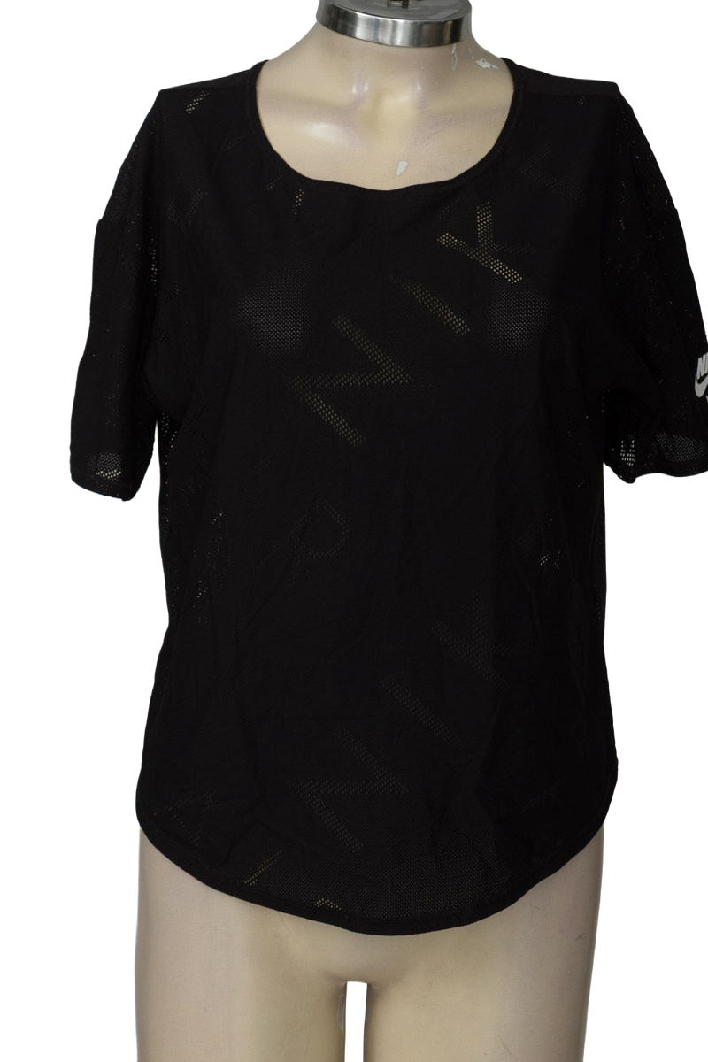 Ropa Deportiva / Salida de Baño color Negro - Nike
