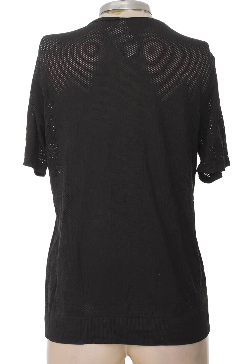 Ropa Deportiva / Salida de Baño color Negro - Nike