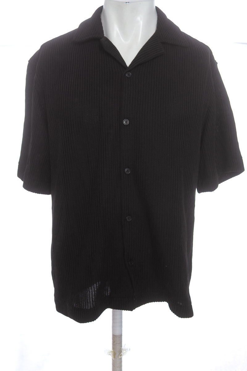 Polo color Negro - H&M