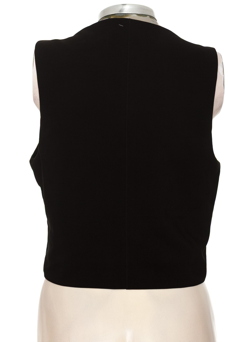 Chaqueta / Abrigo color Negro - Closeando