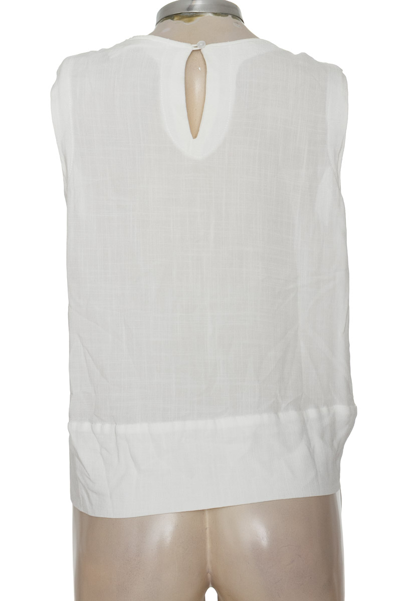Top / Camiseta color Blanco - Closeando