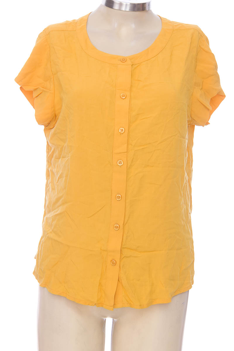 blusa color mostaza con que combina